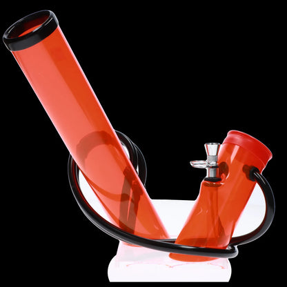 Red glass water pipe with black accents, studio shot.