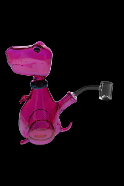 Pink glass dinosaur-shaped dab rig with a quartz banger.