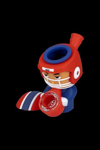 Silicone pipe shaped like a football player in a blue and red uniform.