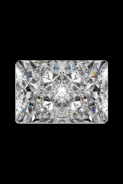 Iridescent cannabis accessory resembling a cut gemstone with “stonerdays” branding.