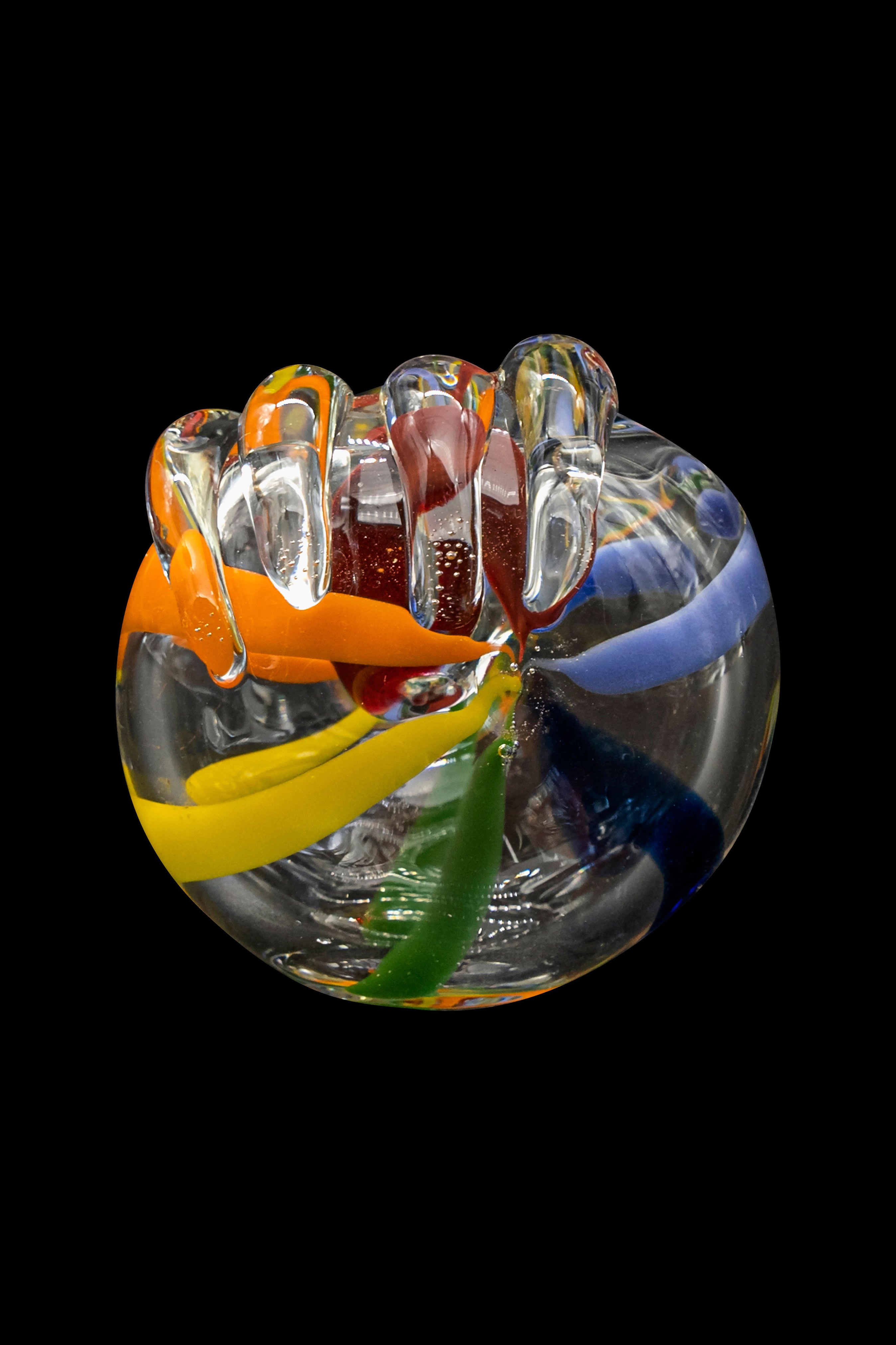 Colorful glass cannabis water pipe against a black background.