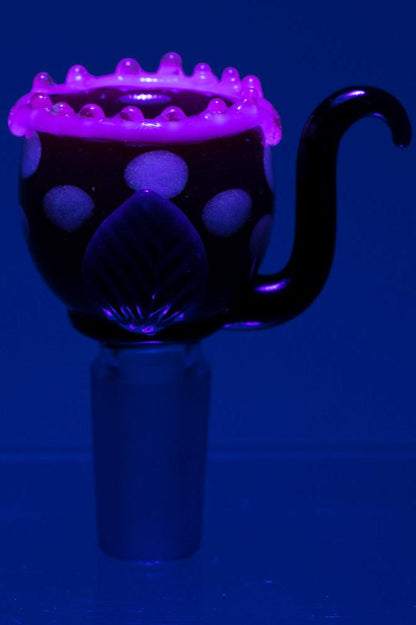 Purple glass cannabis dab rig with intricate detailing.