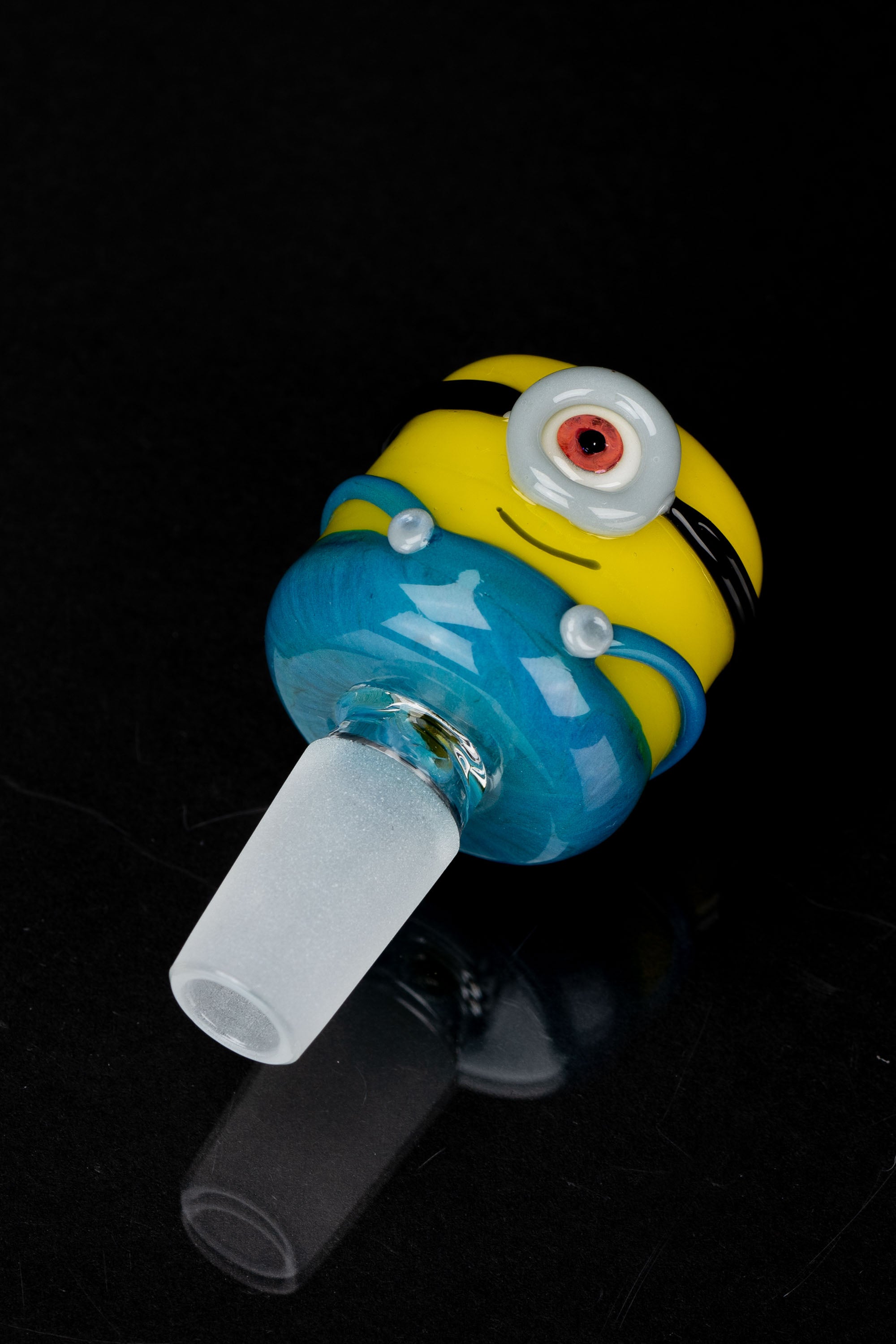 Glass cannabis pipe shaped like a Minion character with a blue and yellow color scheme.