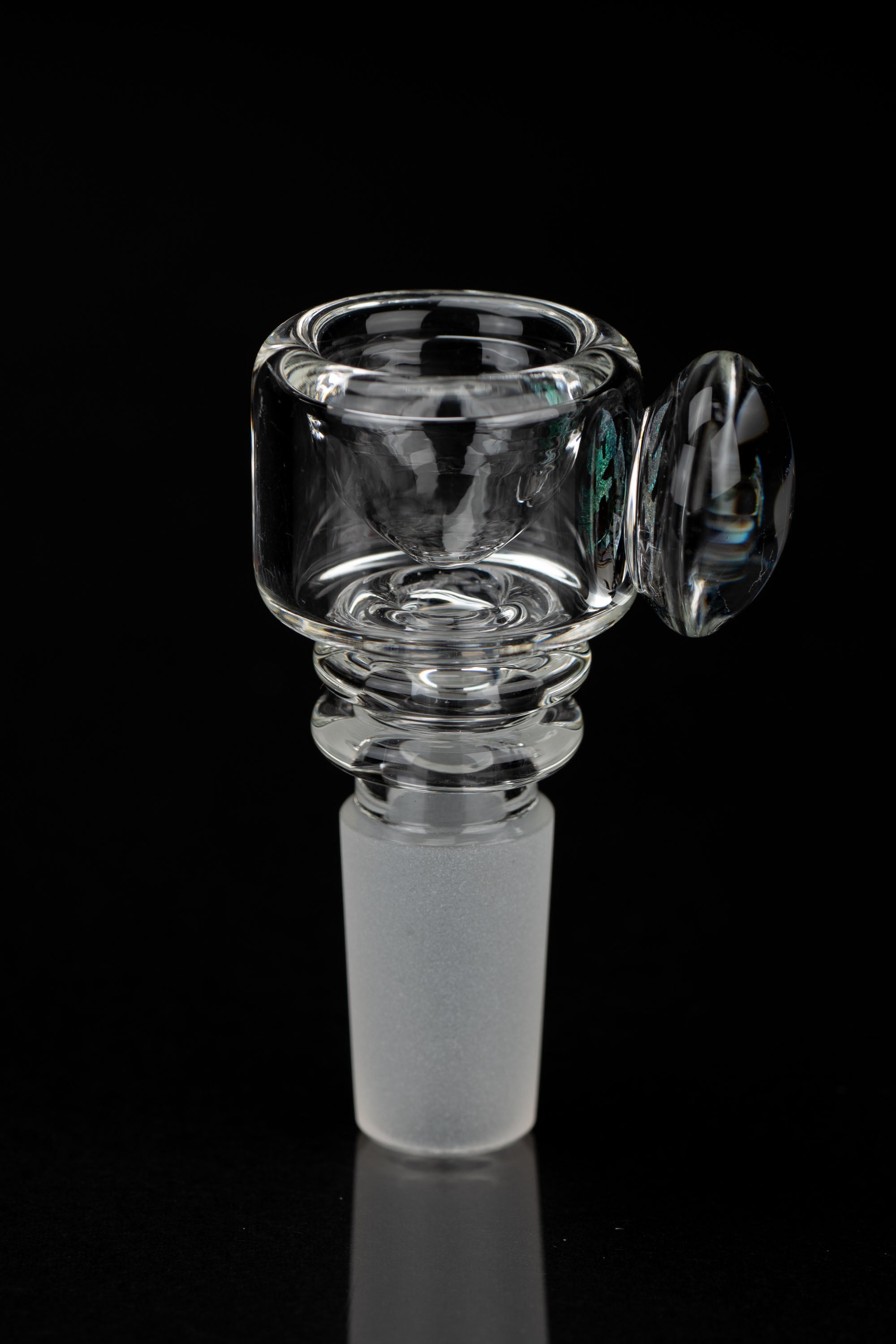 Clear glass bowl piece for a water pipe with a decorative glass marble.