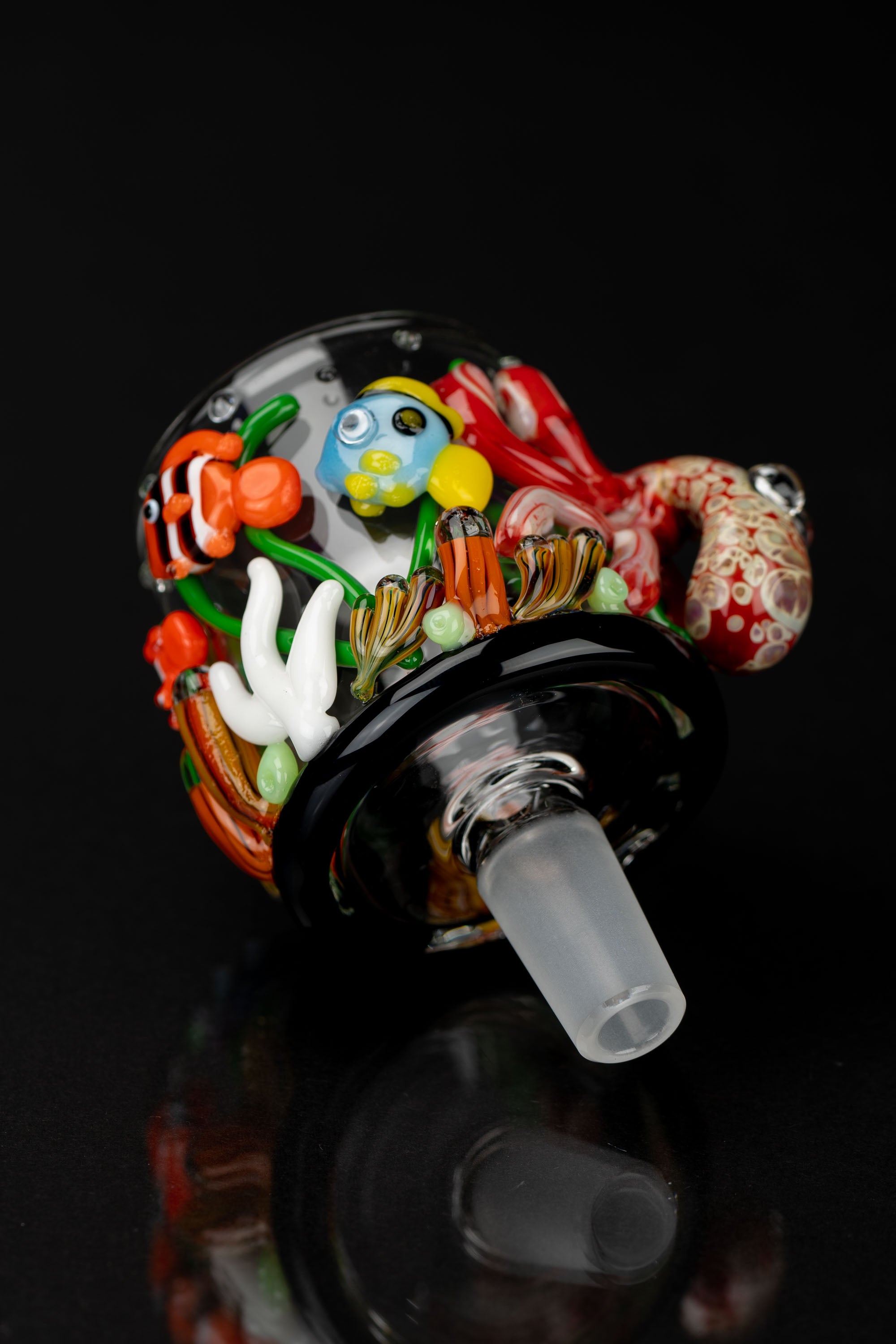 Hand-blown glass cannabis water pipe attachment with colorful floral and mushroom-shaped details.