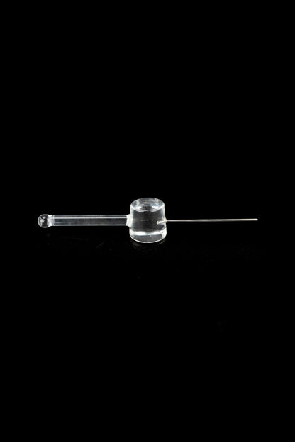 Clear glass oil burner pipe for cannabis concentrates on a black background.