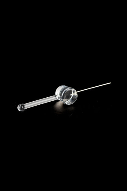 Clear glass oil burner pipe for cannabis concentrates on a black background.