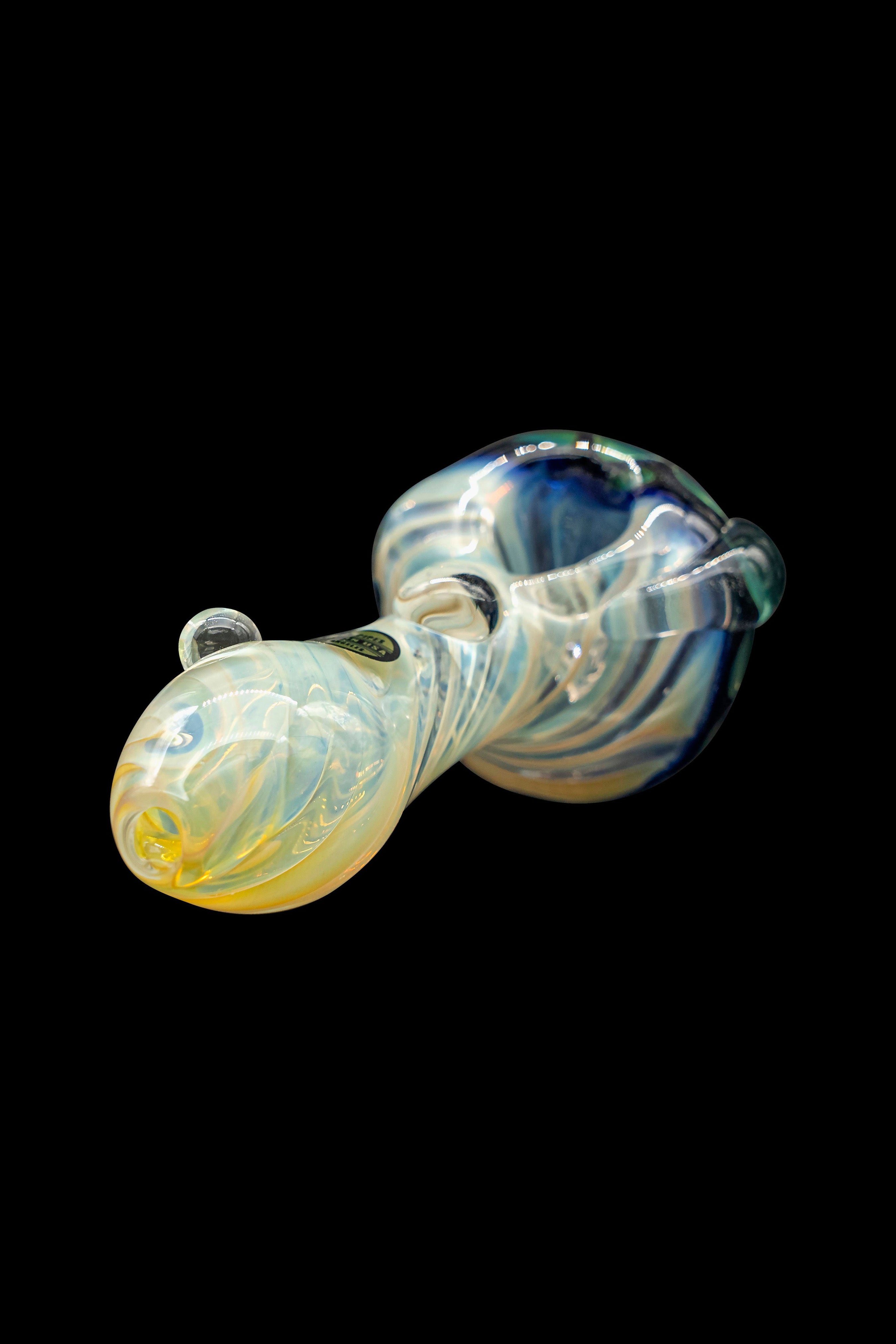 Iridescent glass cannabis pipe against a black background.