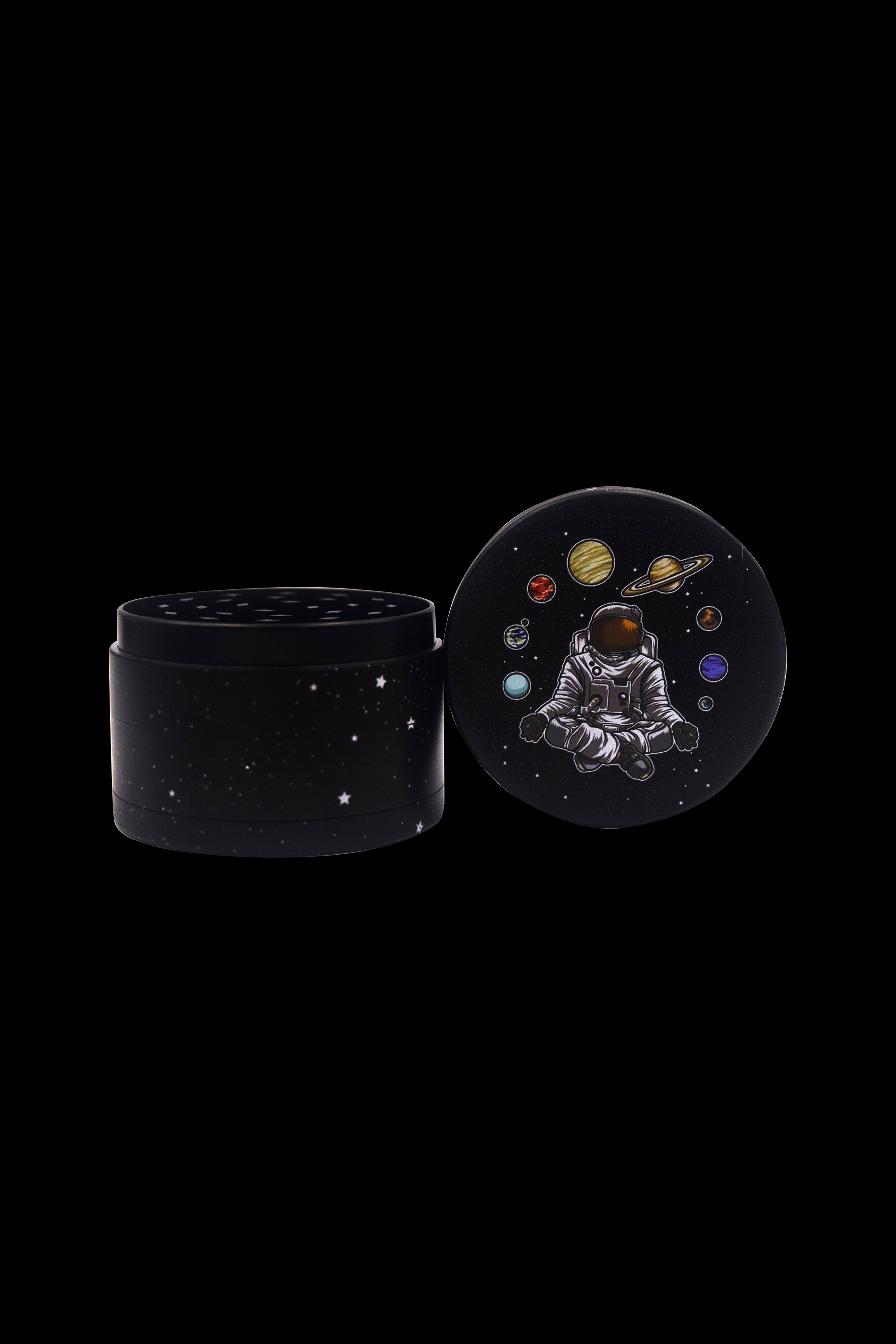 Black cannabis storage jar with a lid depicting an astronaut meditating amongst planets and stars.