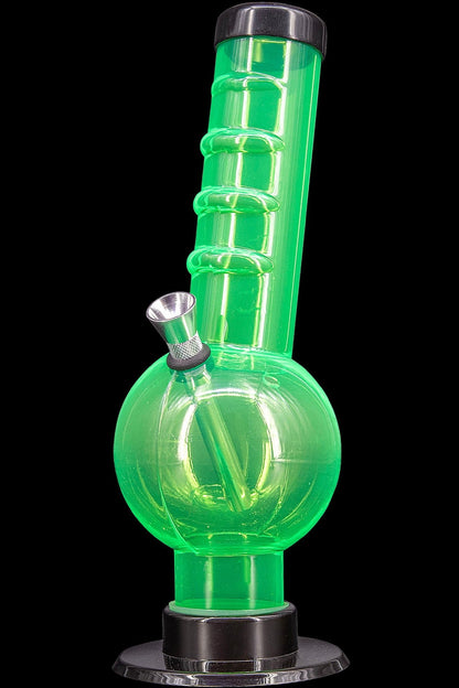 Green glass water pipe (bong) with illuminated neon effect.
