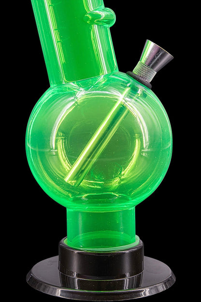Green glass bubbler water pipe with black base.