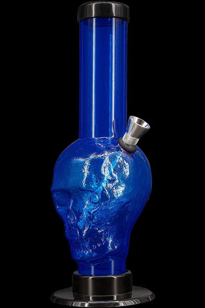 Blue glass water pipe shaped like a skull.