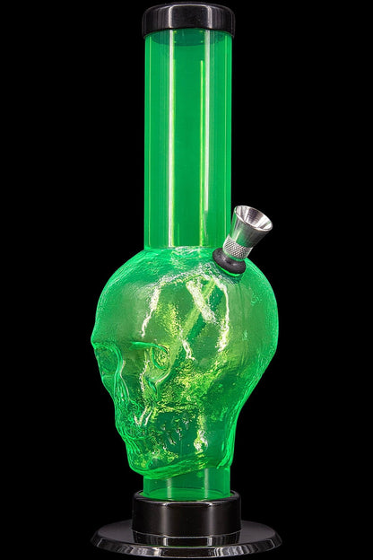 Green glass water pipe shaped like a skull with a metallic bowl piece.