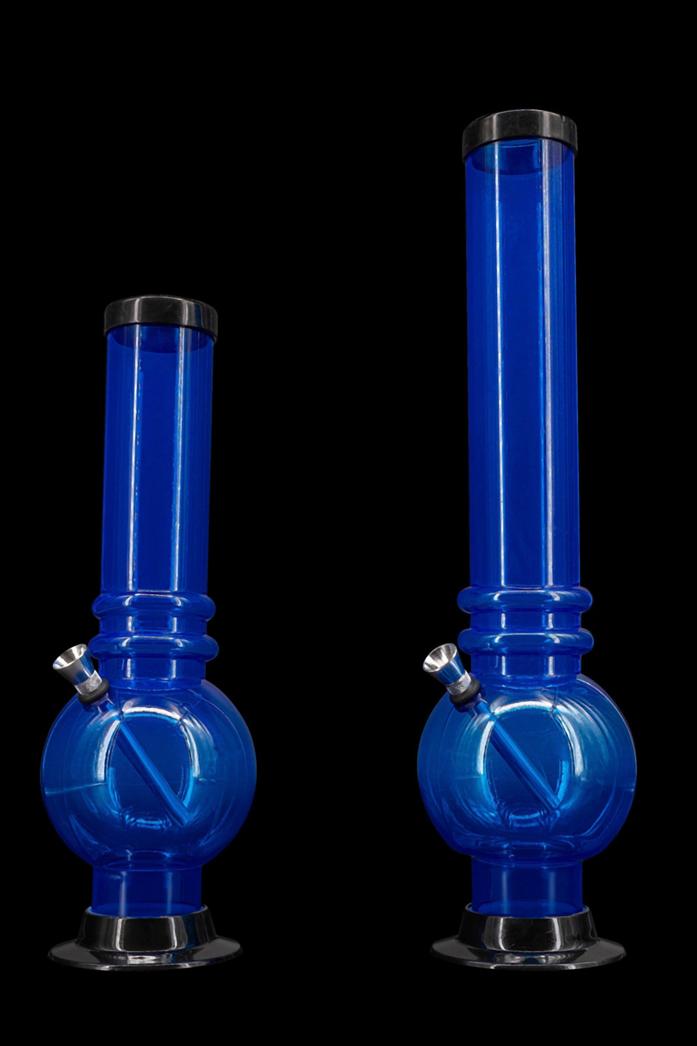 Two blue acrylic water pipes (bongs) against a black background.
