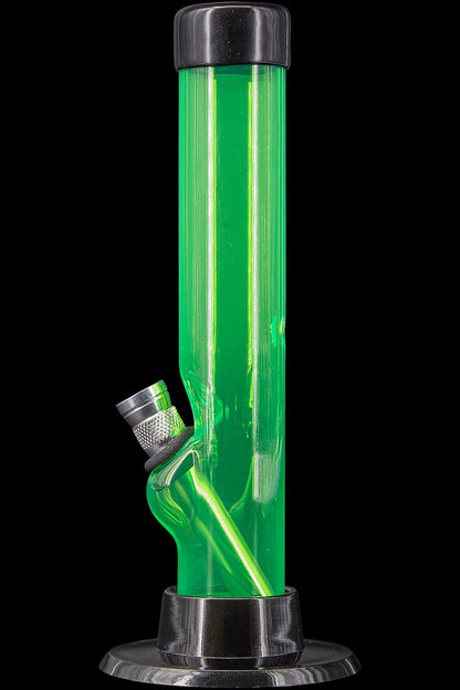Green glass water pipe (bong) with a flared base, studio shot.