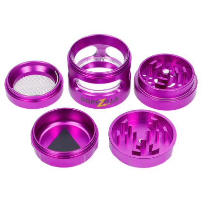 Top-down view of fuchsia metal components arranged in two rows showing the clear-windowed chamber labeled “Epic 420 House Party” Deluxe Box with matching grinder and mesh screen.