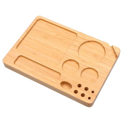 Angled top-down view of a light bamboo organizer board for the “Epic 420 House Party” Deluxe Box showing rectangular and circular recessed trays and small round wells.