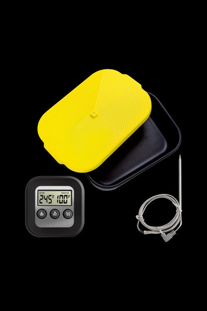 Digital sous vide immersion circulator with temperature probe and vacuum seal bags, used for precise cannabis infusion and decarboxylation.