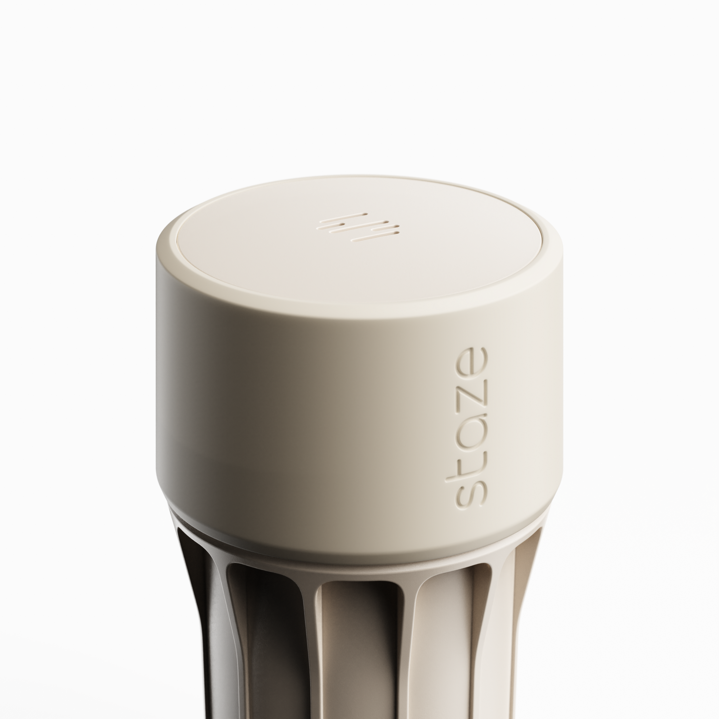 Close-up, top-down view of the beige STAZE PRESERVE showing its rounded lid, subtle vents, and vertical ribbed body.