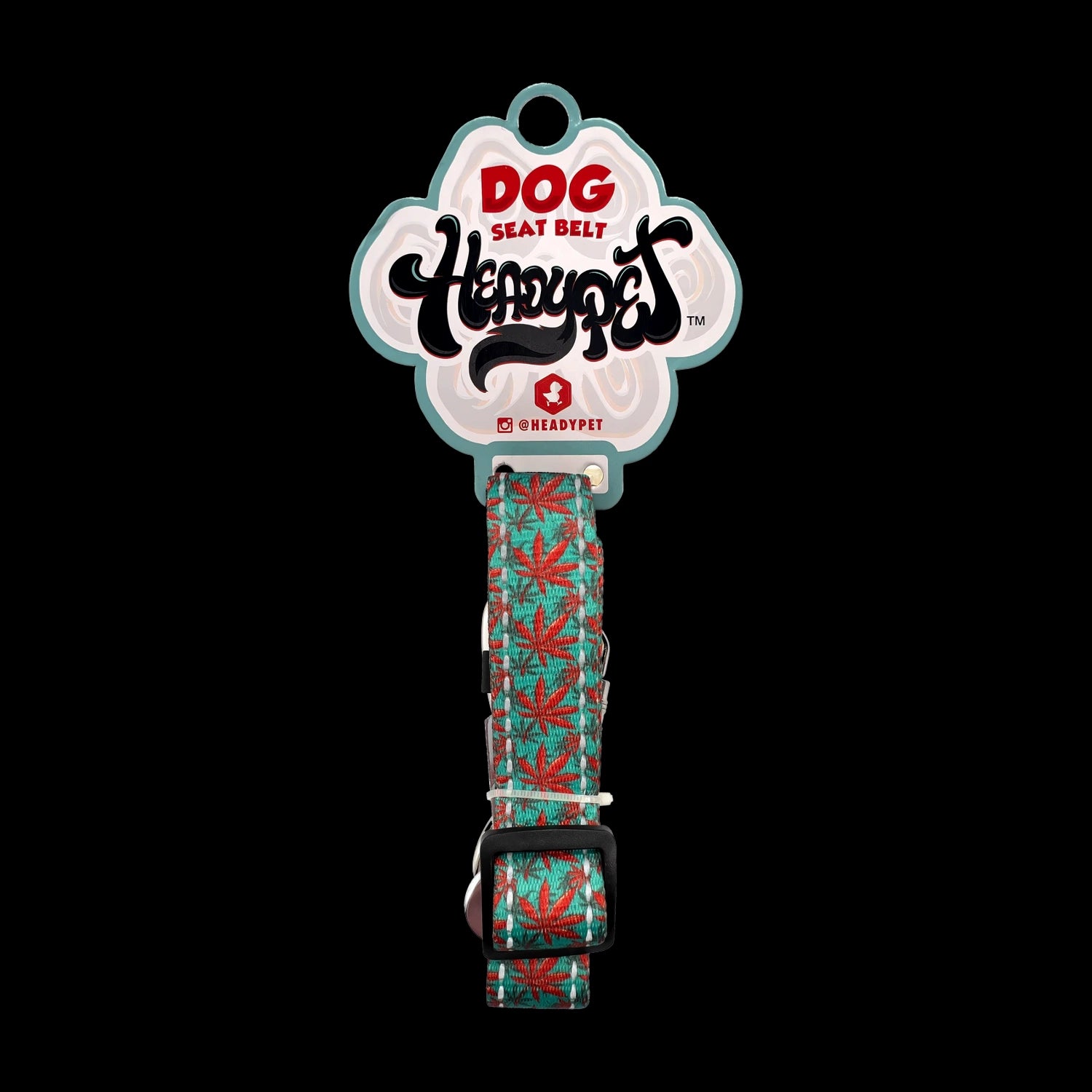 Center-frontal shot of the Smoke Cartel HeadyPet Seat Belt Caribbean dog seat belt strap with teal and red leaf pattern.