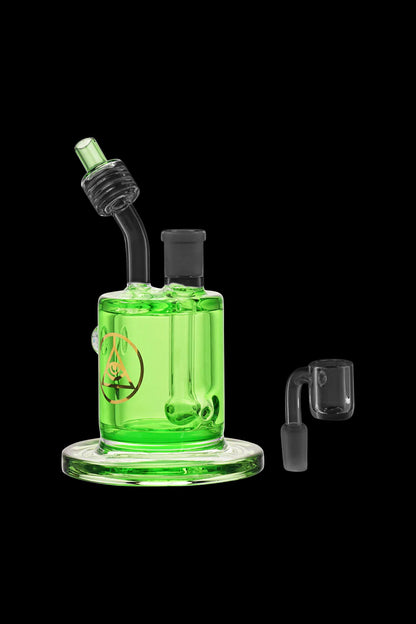 Green glass bubbler water pipe with removable bowl, studio shot on a black background.
