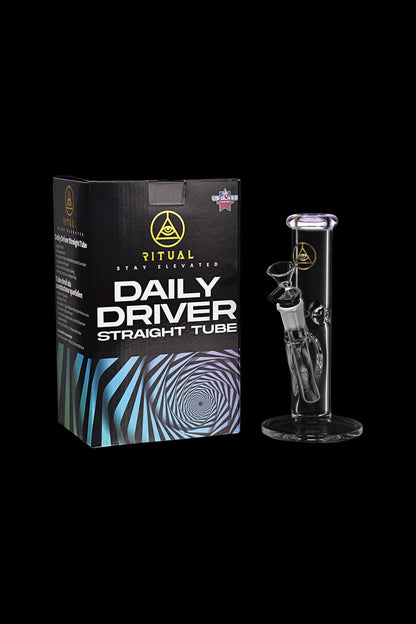 Product shot of a “Daily Driver” glass tube and stand, packaged in a black box with colorful geometric design.