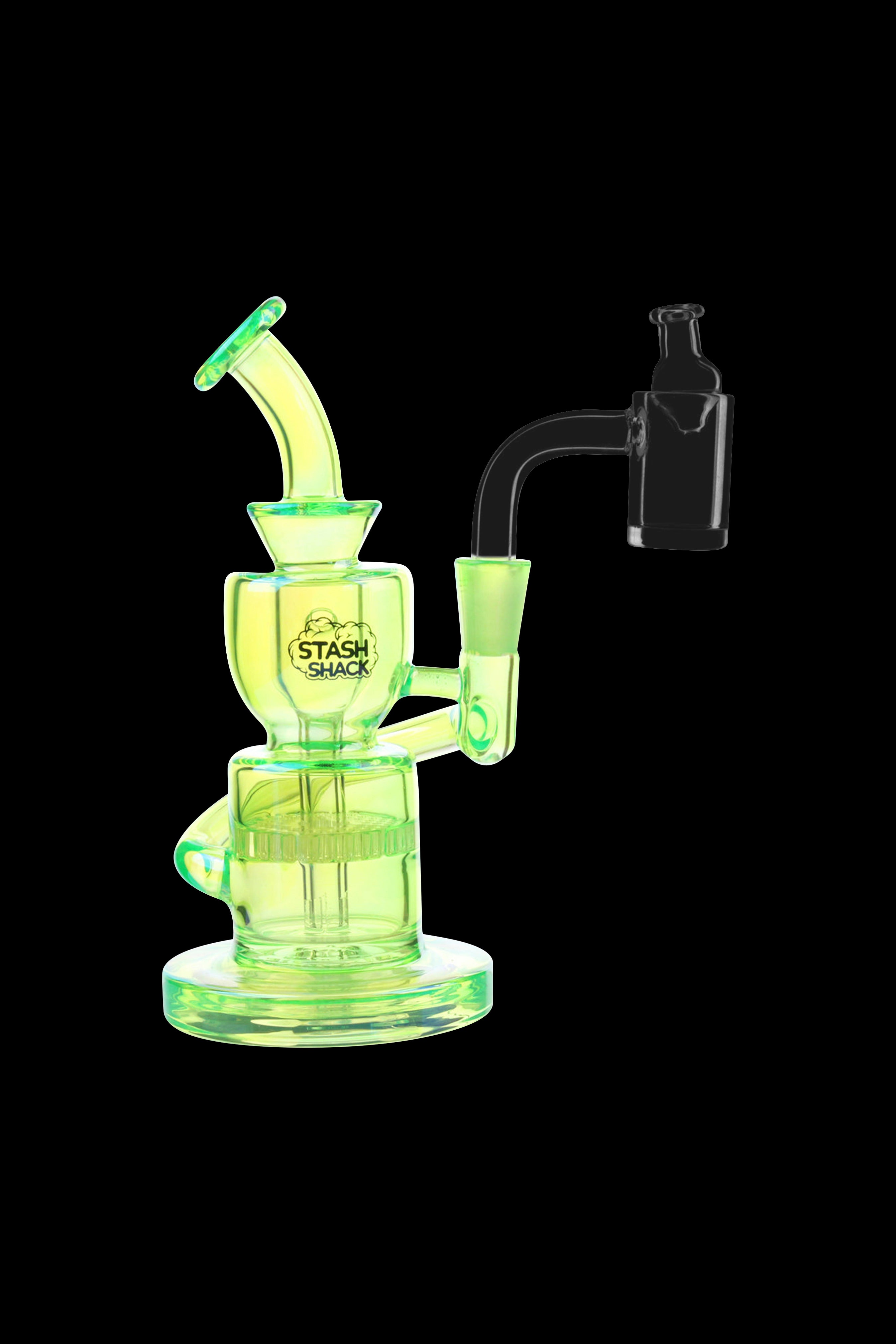Green glass dab rig with a bubbler and quartz banger.