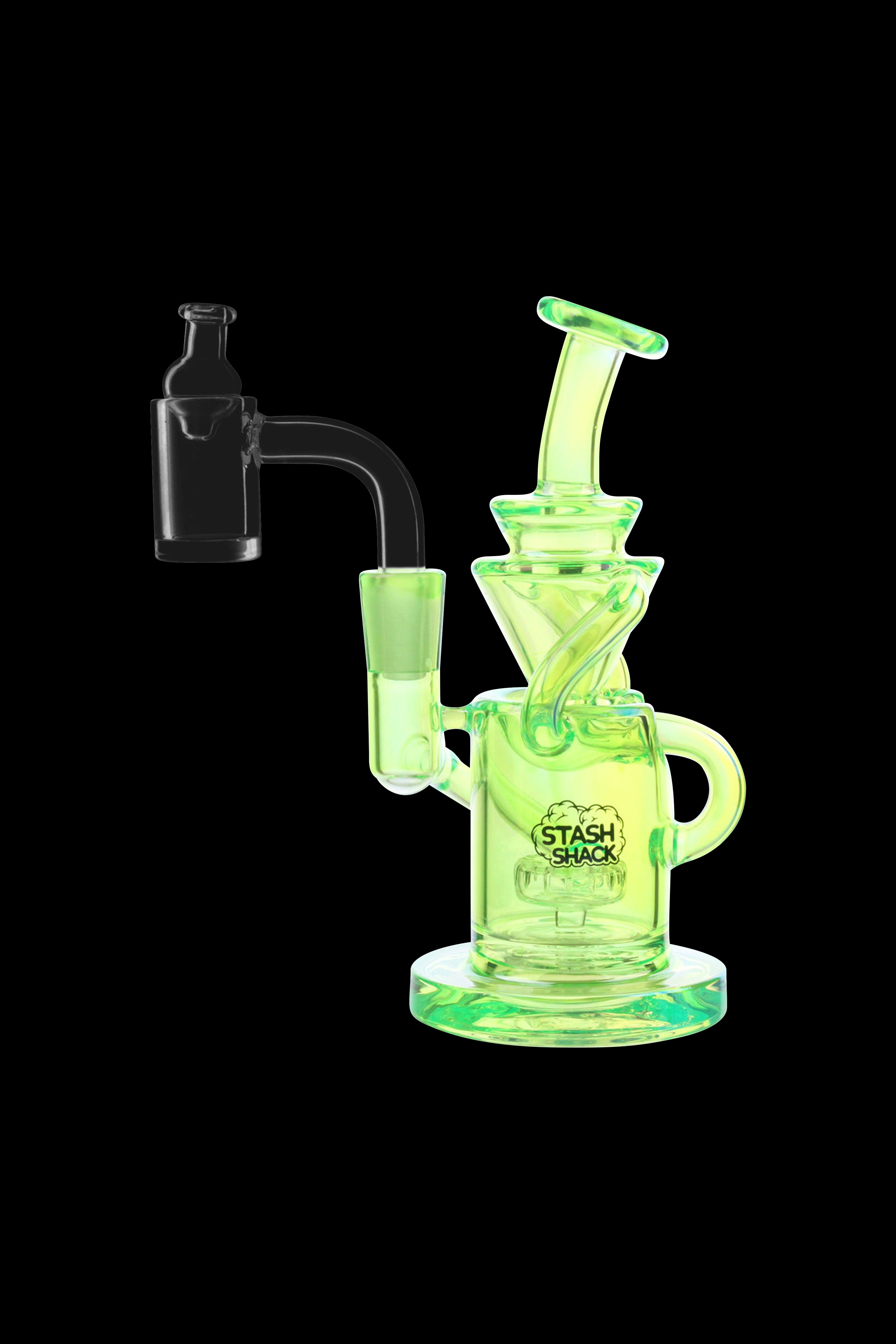 Green glass dab rig with a quartz banger, branded "Stash Shack."