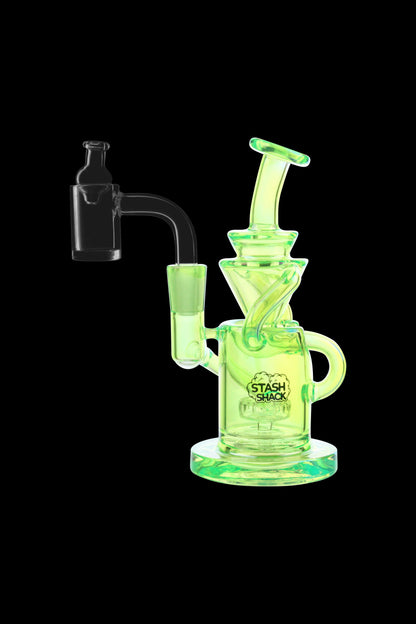 Green glass dab rig with a quartz banger, branded "Stash Shack."