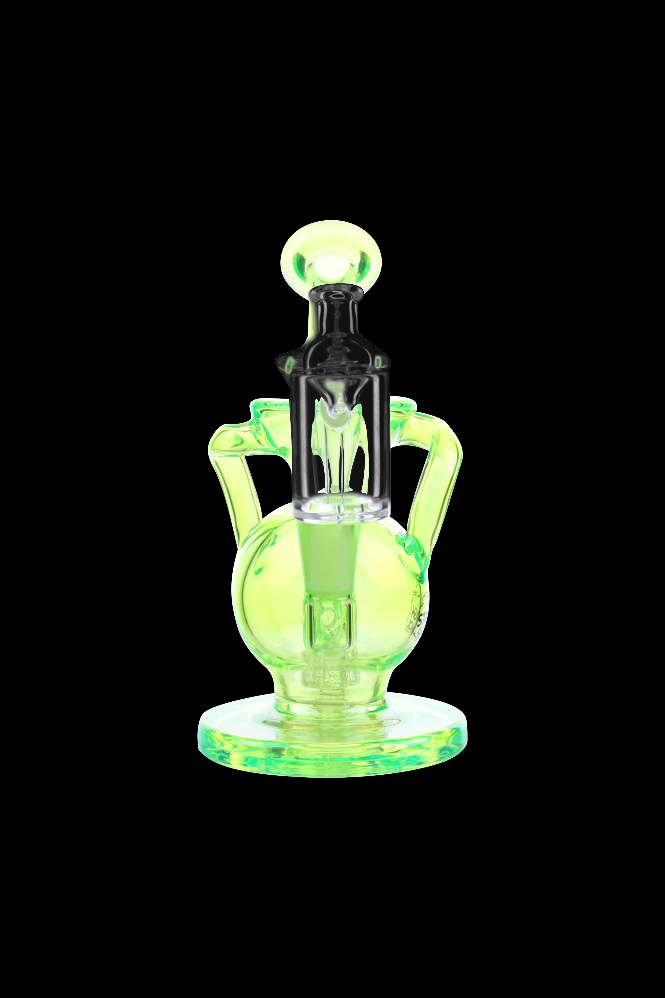 Green glass rig with intricate bubbler and mouthpiece.