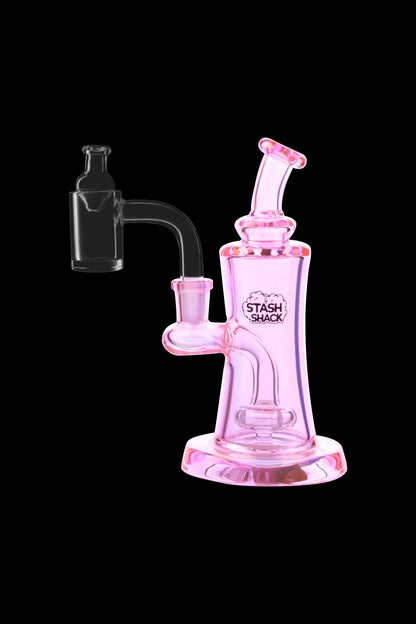 Pink glass dab rig with a quartz banger, branded "Stash Shack."