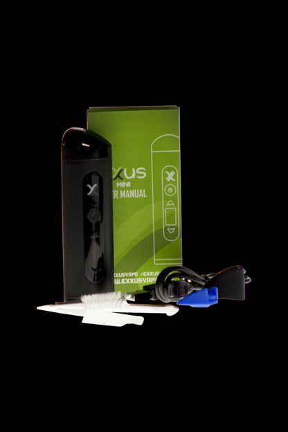 A sleek, angled studio shot of the Exxus Mini Vaporizer displayed next to its packaging, highlighting the product’s compact size.