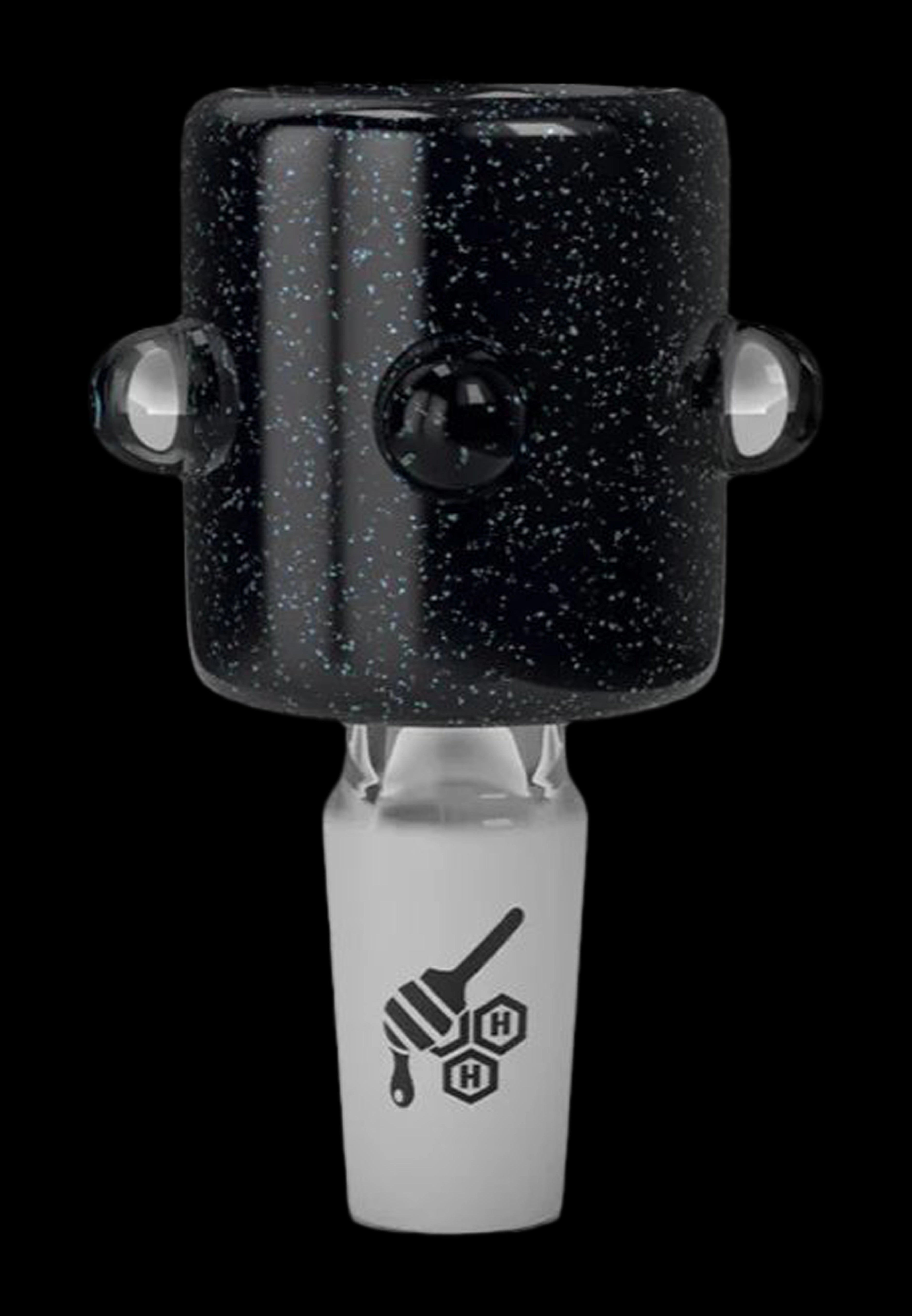 Black and white glass dab rig with honeycomb branding.