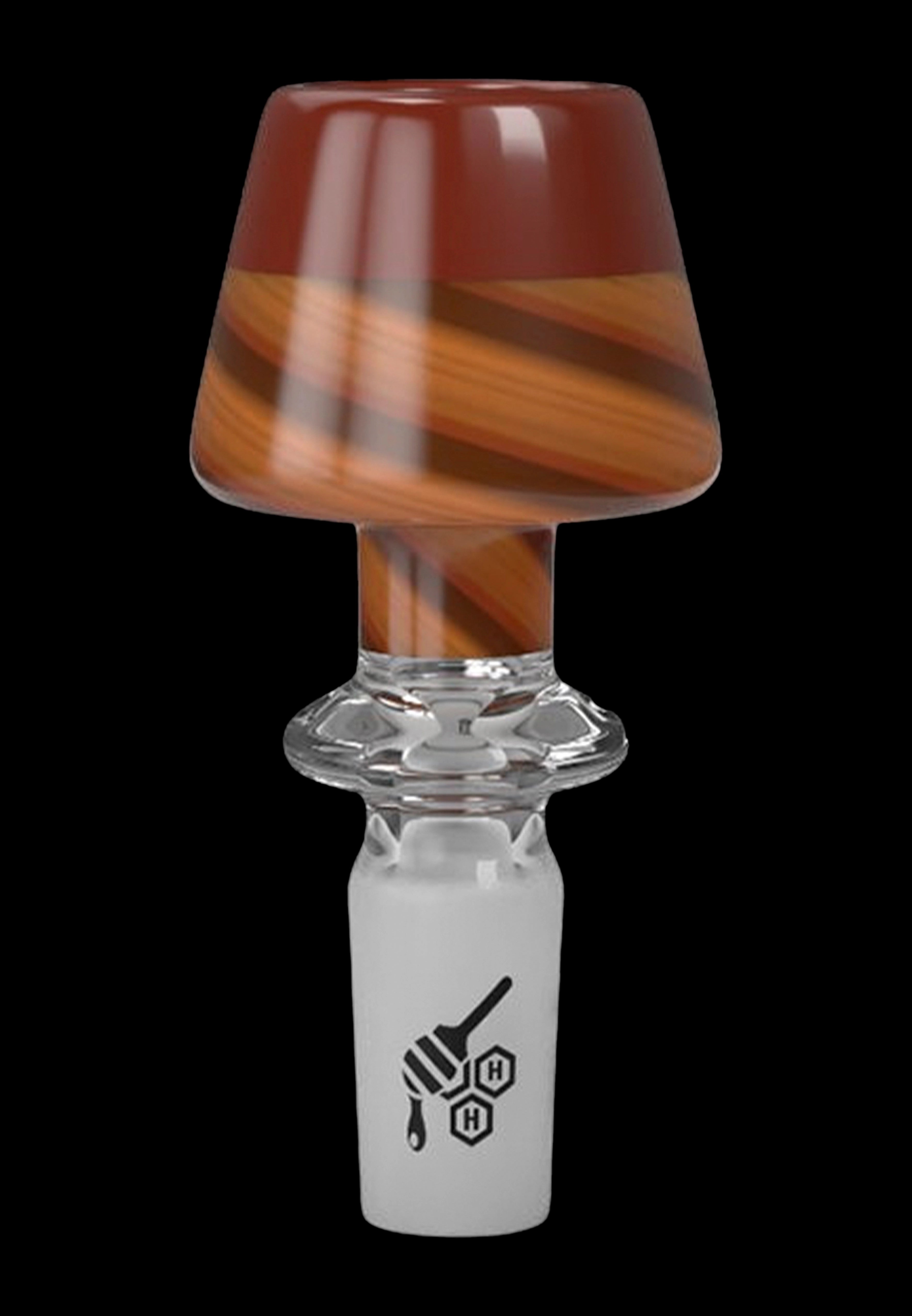 Orange and clear glass dab rig attachment with branding.