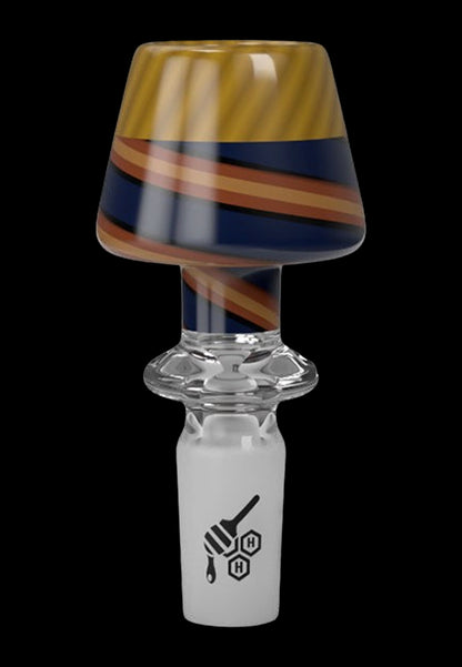 Colorful glass cannabis bowl with patterned dome and branded base.