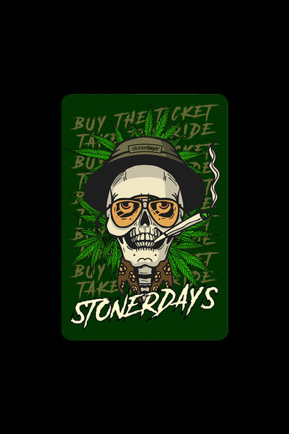 A green graphic featuring a skull wearing aviator goggles and a bandana with the text “StonerDays” and “Buy the Ticket Ride.” Cannabis leaves surround the skull.