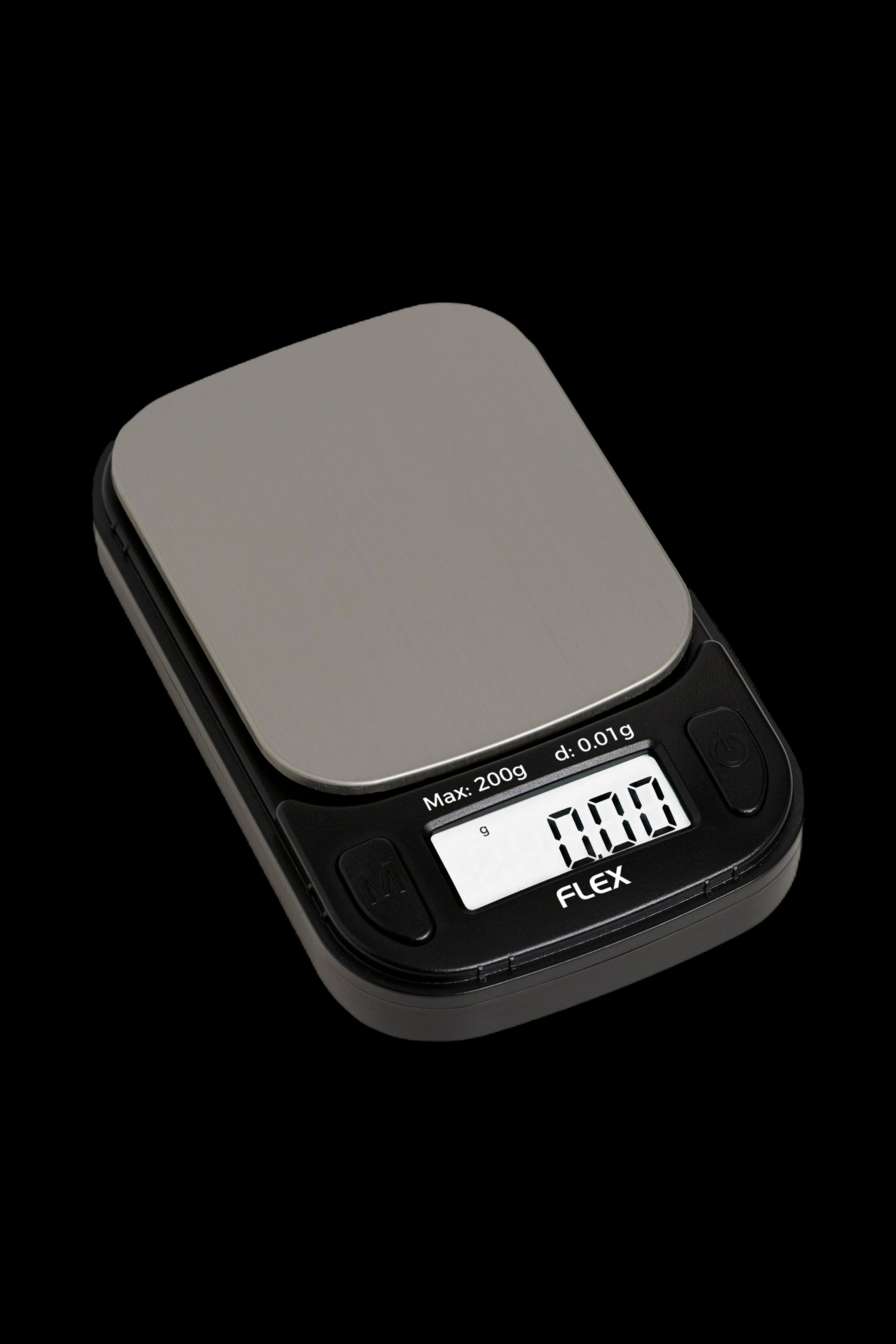 Digital scale displaying 0.77g, commonly used for measuring cannabis.