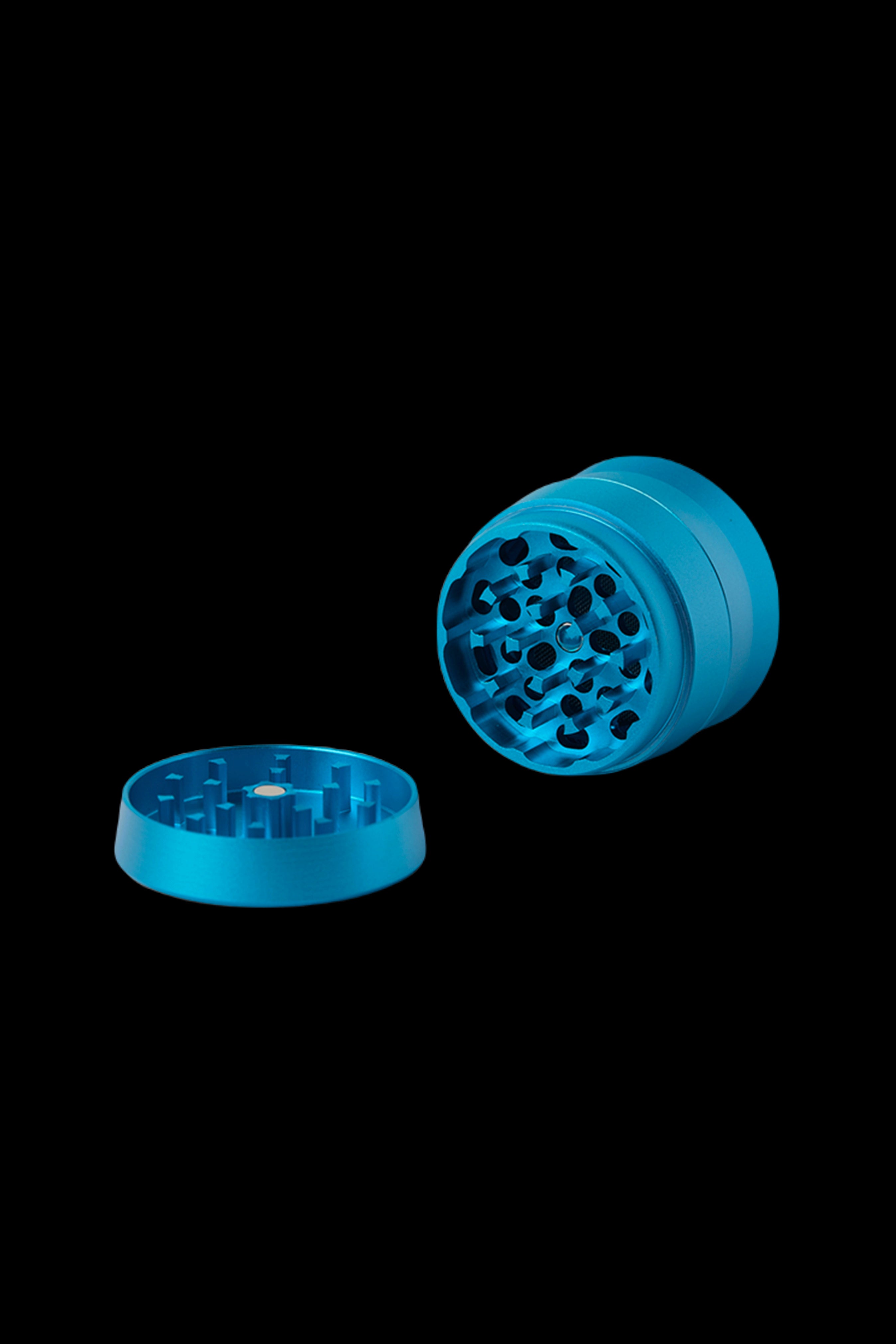 Blue cannabis grinder, disassembled.