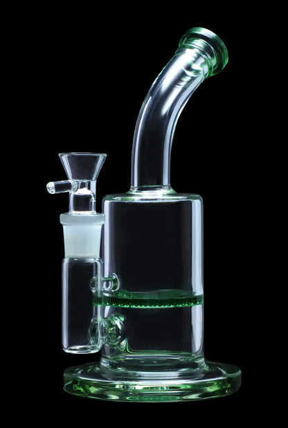 Clear glass water pipe (bong) with green accents, isolated on a black background.