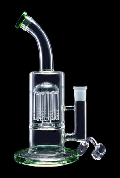Clear glass water pipe (rig) with multiple diffusion stems and green accents, isolated on a black background.