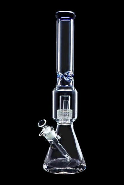 Clear glass water pipe (bong) with intricate percolator filtration system.