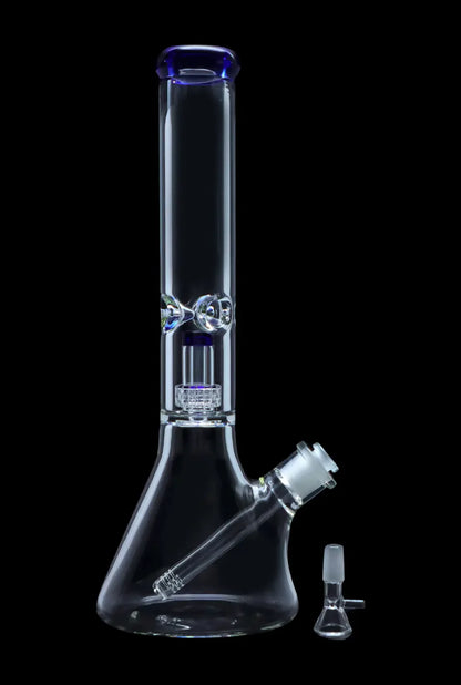 Clear glass bong with blue accents and diffusion perc, alongside a glass bowl.