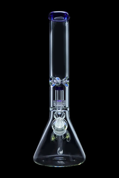 Clear glass bong with blue accents and intricate perc filtration system, isolated on black.