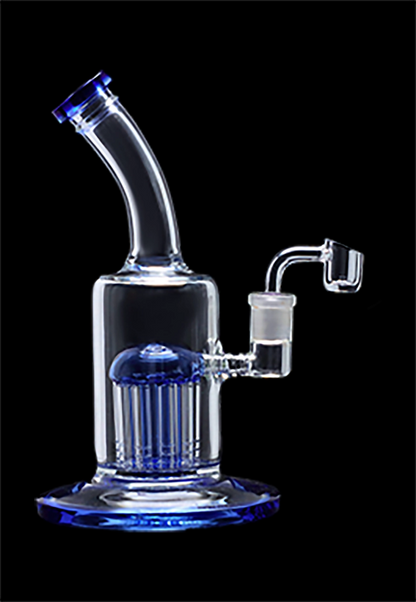 Blue glass water pipe with quartz banger.