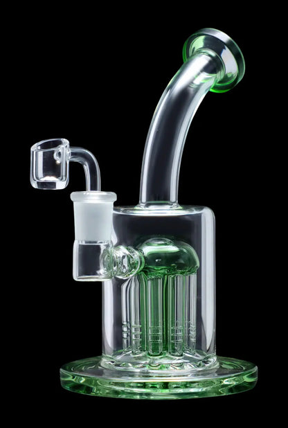 Green glass dab rig with multiple percolators, isolated on a black background.