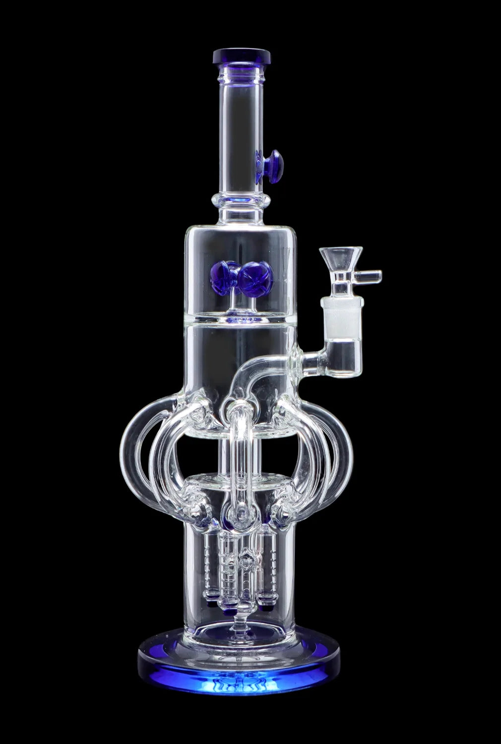 Clear glass water pipe (bong) with blue accents and intricate percolators, isolated on a black background.