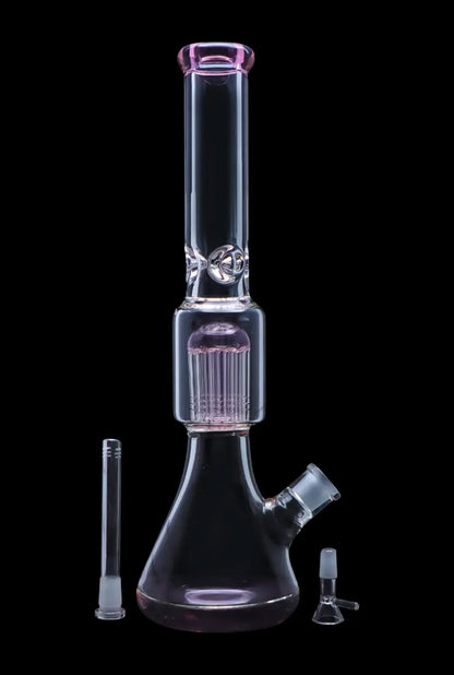 Glass water pipe (bong) with diffusion stem and accessories, isolated on black.