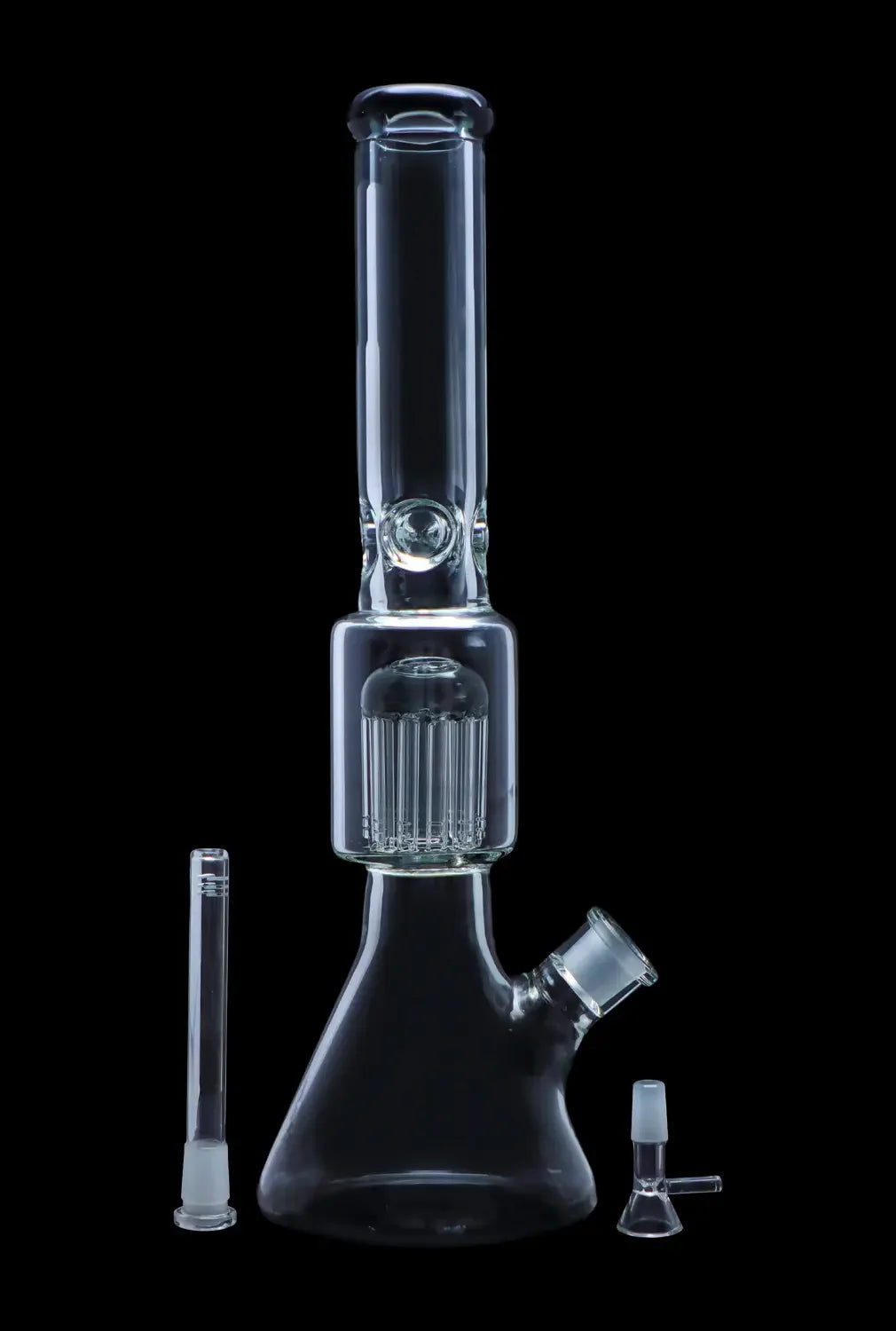 Clear glass water pipe (bong) with percolator and accompanying glass downstem and bowl, isolated on a black background.