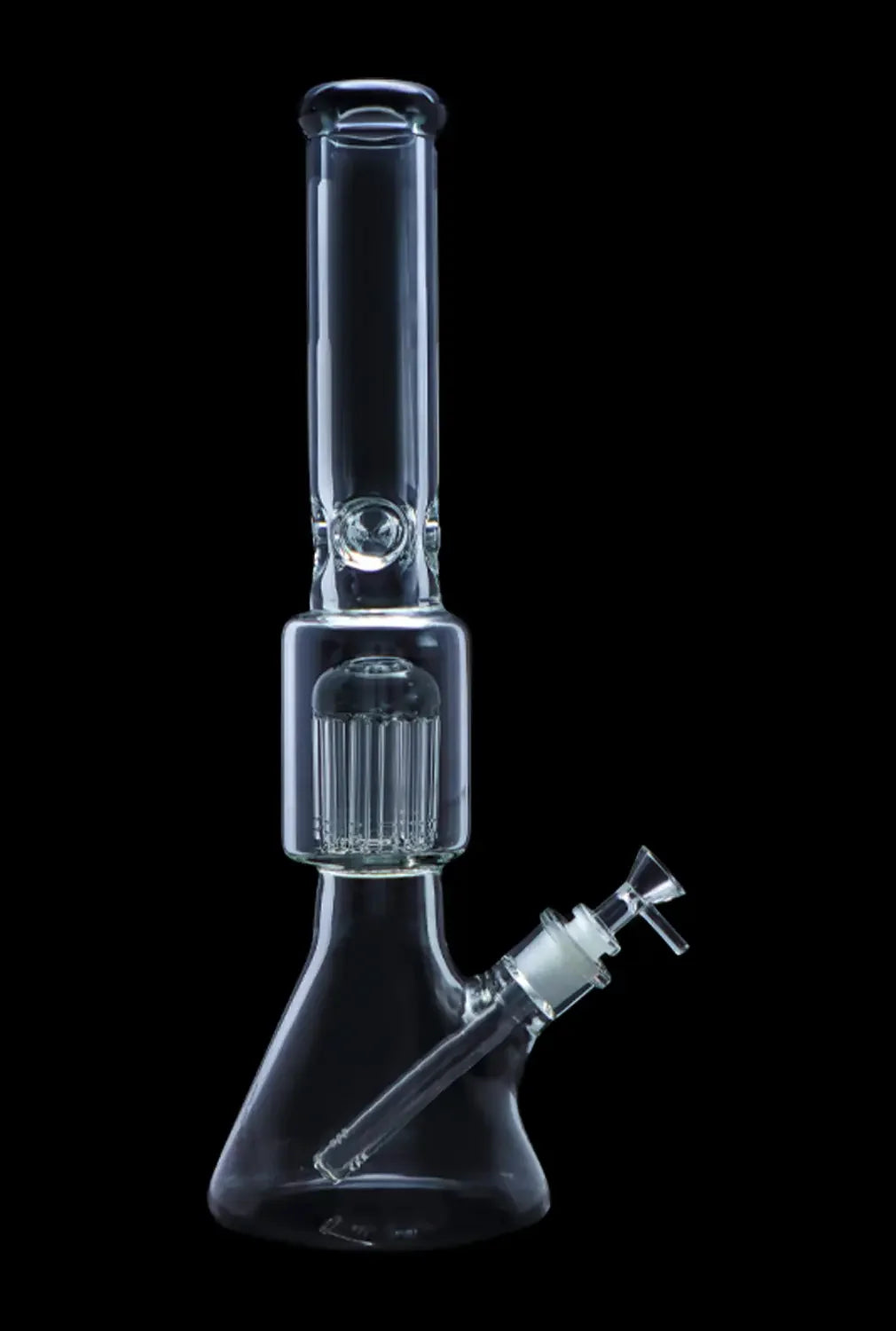 Clear glass bong with multiple perc filtration system, isolated on black.