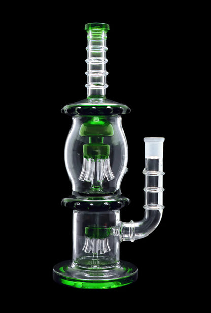 Green glass water pipe (rig) with percolators, isolated on black.
